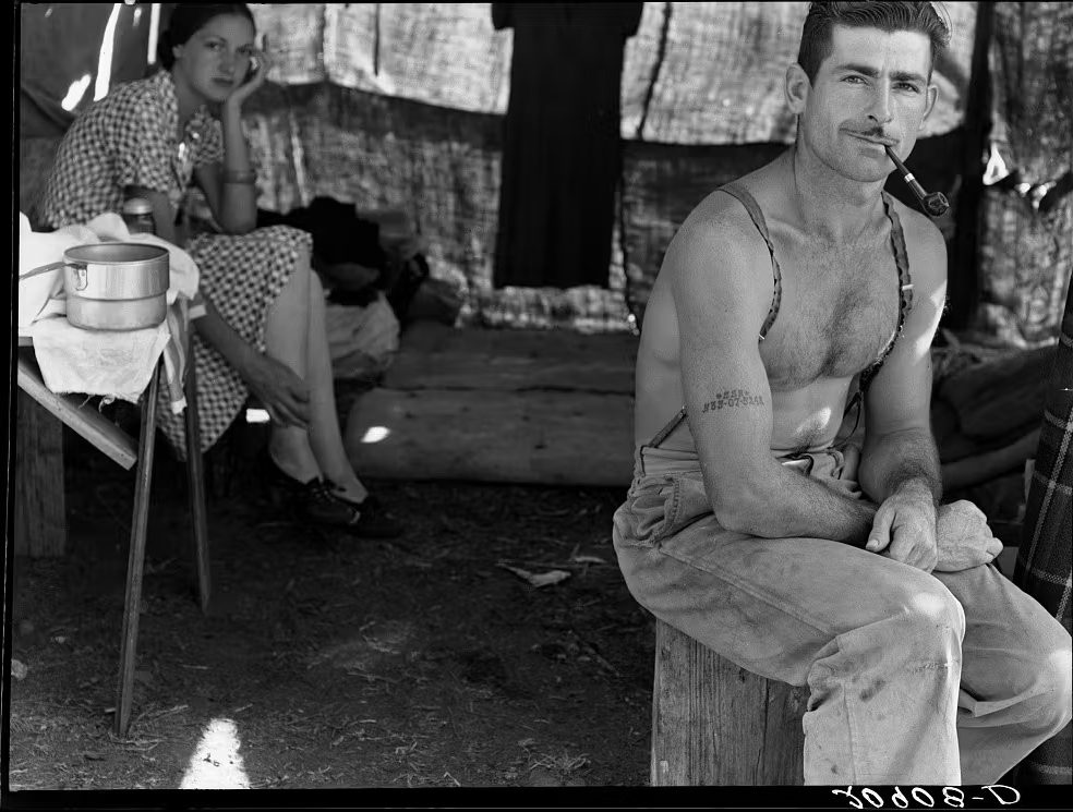 Oregon, August 1939. Unemployed lumber worker goes with his wife to the bean harvest